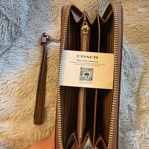 Coach Long Zip Around Wallet
In Signature Canvas - Picture 12 of 15